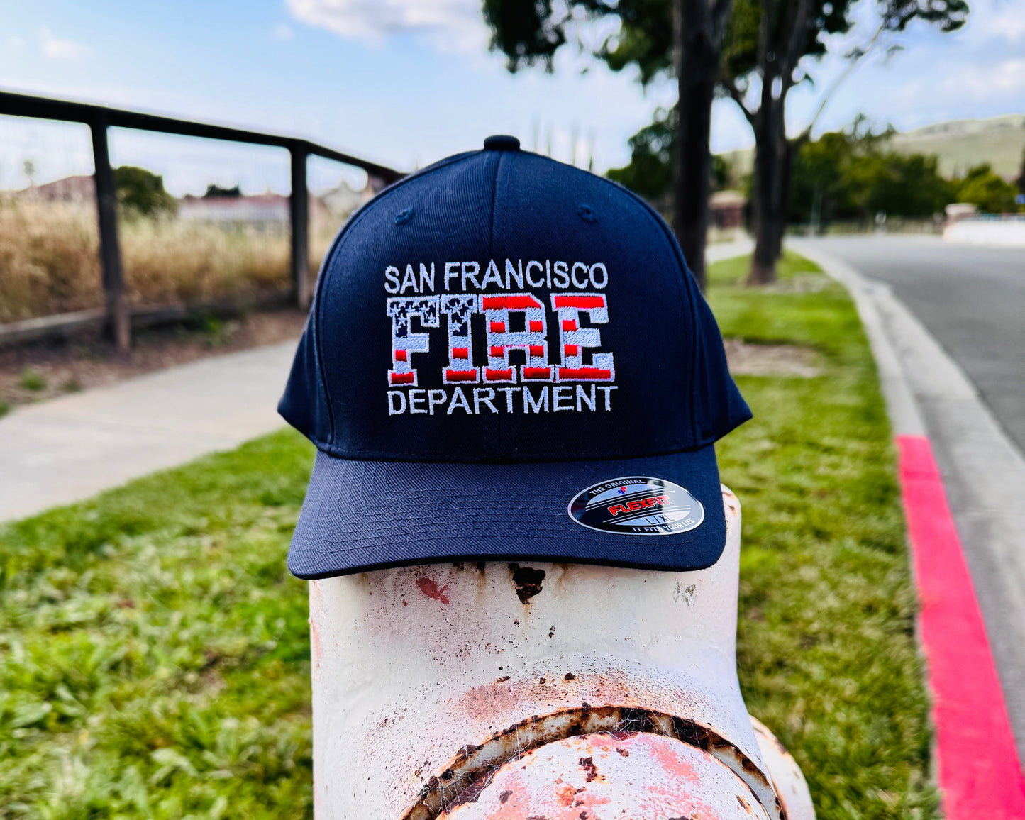 Fire Department Hat with the USA Flag inside the word FIRE