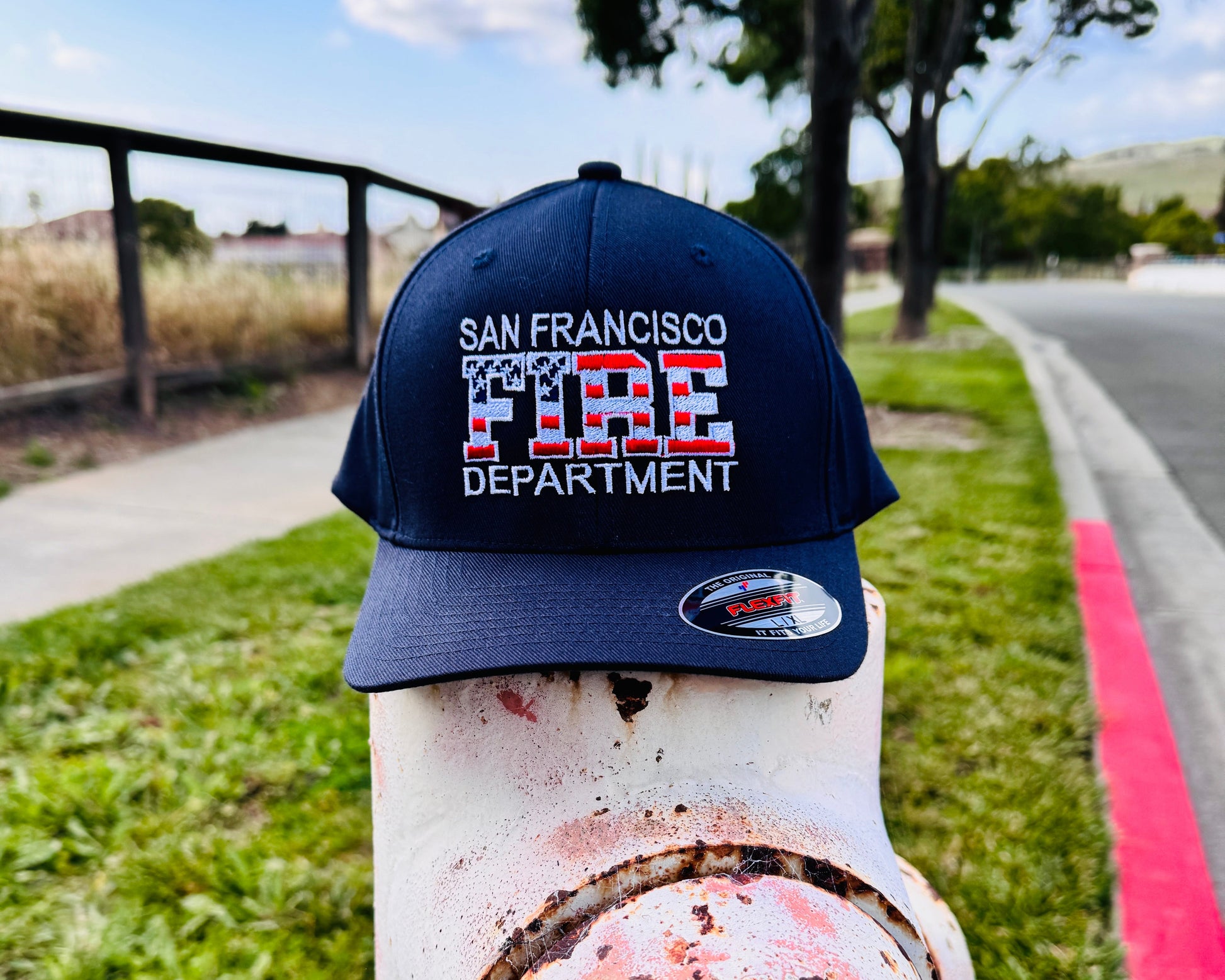 Fire Department Hat with the USA Flag inside the word FIRE